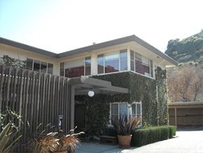 Los Angeles apartment for rent - a house with a fence and plants in front of it