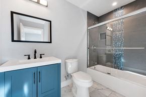 Canoga Park apartment for rent - a bathroom with a sink toilet and a shower