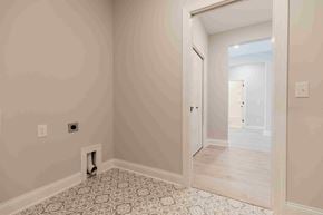 Woodbury house for rent - a living room with a doorway and a door to a bedroom