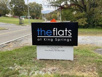 Johnson City apartment for rent - a sign for the flats at king springs