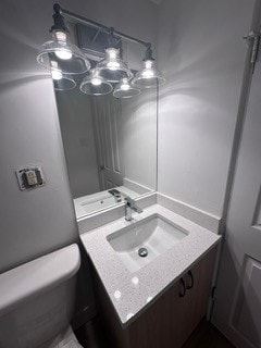 Calgary apartment for rent - A bathroom with a sink, mirror, and lights.