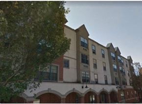 Coatesville apartment for rent - a building with a tree in front of it