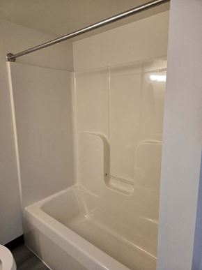 Coatesville apartment for rent - a white bathroom with a shower and a toilet