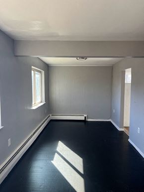 Cincinnati apartment for rent - A room with a window and a door.