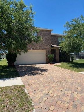 Jacksonville house for rent - A house with a driveway in front of it.