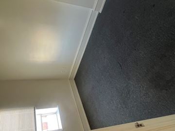 Coatesville apartment for rent - the wall in the living room has been repaired and is ready to be painted