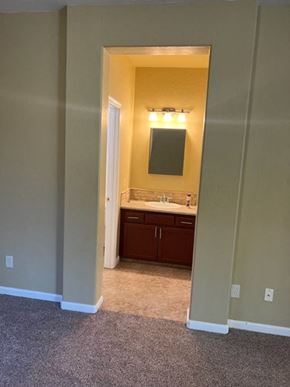 Tulare house for rent - a bathroom with a sink and a mirror