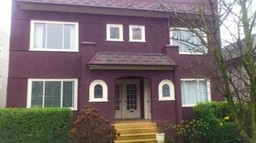 Vancouver apartment for rent - a red house with a front door and steps