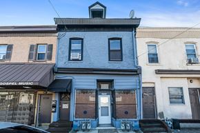 Chester apartment for rent - A blue building with a sign that says GOSPEL MUSIC.