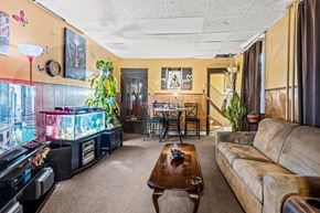 Chester apartment for rent - A living room with a couch, coffee table, and a fish tank.