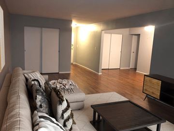 Cincinnati apartment for rent - a living room with a couch and a table