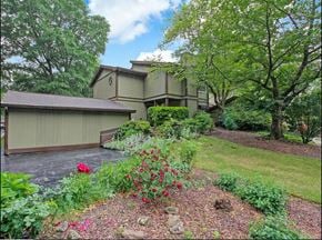Atlanta house for rent - a house with a garden in front of it