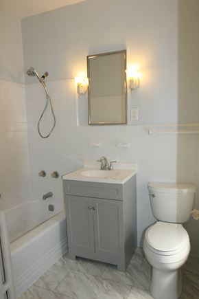 Philadelphia apartment for rent - a small bathroom with a toilet and a sink and a bath tub