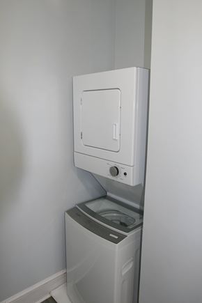 Philadelphia apartment for rent - a washing machine and a toilet in a white room