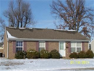 Owensboro house for rent - a brick house with snow on the ground
