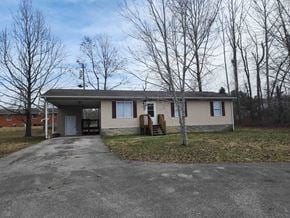 Clearfield house for rent - A house with a grey roof and a grey driveway.