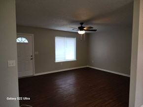 Clearfield house for rent - A room with a ceiling fan and a window.