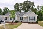 Rocky Mount apartment for rent - A white house with a grey roof and a black car in front.