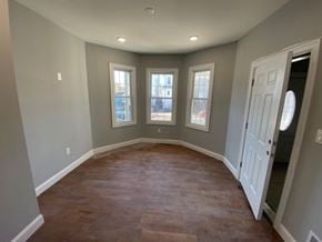 Elizabeth apartment for rent - A room with a brown floor and a white door.