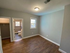 Elizabeth apartment for rent - A room with a window and a door leading to a bathroom.