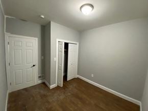 Elizabeth apartment for rent - A room with a white door and a brown floor.