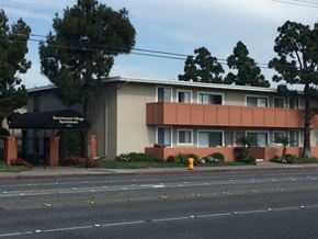Huntington Beach apartment for rent - the front of a building with a yellow fire hydrant