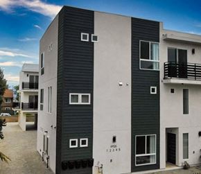 North Hollywood apartment for rent - a tall apartment building with black and white walls