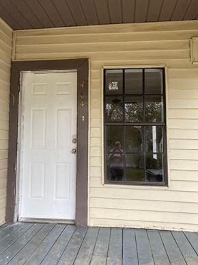 El Campo house for rent - a white door and a window on the side of a house