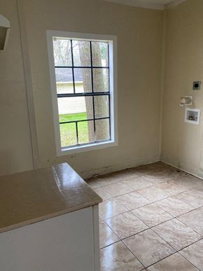 El Campo house for rent - an empty kitchen with a window in it