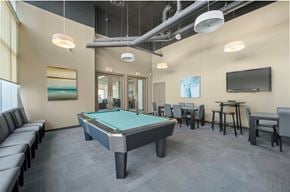 Port Moody apartment for rent - A room with a pool table and a television.