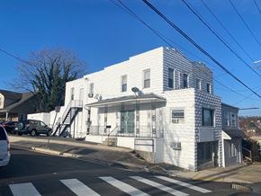 Baltimore apartment for rent - a white house on the corner of a street