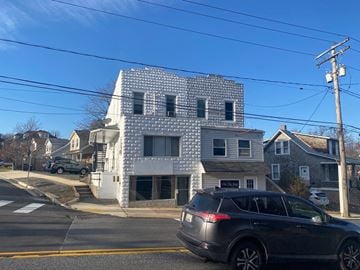 Baltimore apartment for rent - a building with a checkered facade on a city street