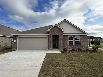 Youngsville house for rent - a brand new house with a driveway and a garage door