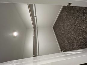 Youngsville house for rent - a modern bathroom with a shower with a glass door