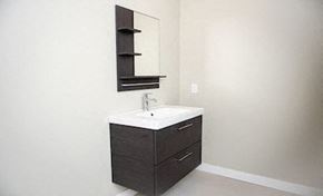 Fargo apartment for rent - a bathroom with a sink and a mirror