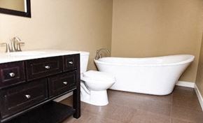 Fargo apartment for rent - a bathroom with a toilet and a tub and a sink