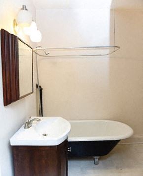 Fargo apartment for rent - a bathroom with a sink and a bath tub