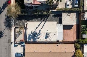 Palm Desert apartment for rent - a birds eye view of a roof with cars on it