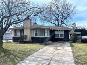 Merrillville house for rent - a house with a sidewalk in front of it