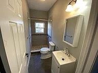 Elizabeth apartment for rent - A small bathroom with a toilet and sink.