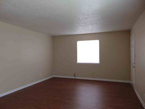 Marble Falls apartment for rent - an empty room with wooden floors and a window