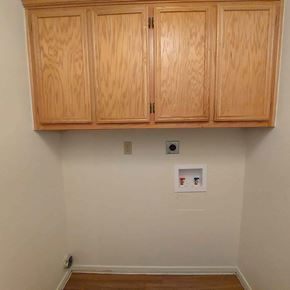 Marble Falls apartment for rent - A small picture is hanging on the wall under the cabinets.