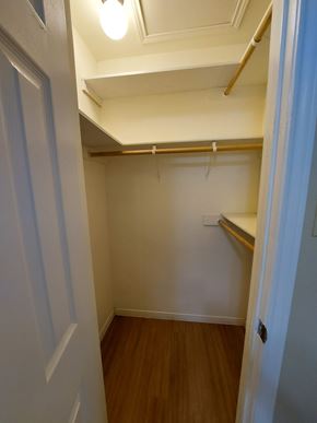 Marble Falls apartment for rent - A small, empty room with a wooden floor and white walls.