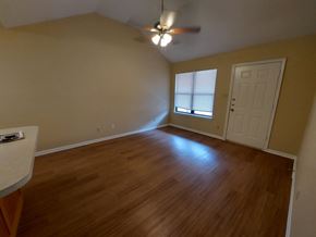 Marble Falls apartment for rent - A room with a ceiling fan and a window.