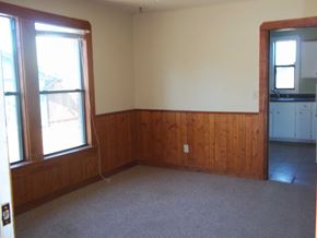 Austin apartment for rent - A room with a window and a wooden wall.
