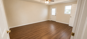 Marble Falls apartment for rent - A room with wooden flooring and white walls.