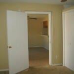 Marble Falls apartment for rent - A white door is open to a room with a carpeted floor.