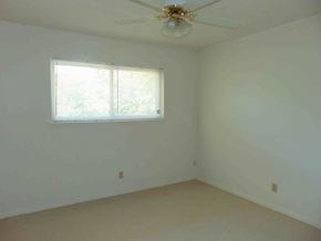Marble Falls apartment for rent - an empty room with a ceiling fan and a window