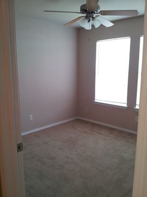 Marble Falls apartment for rent - an empty room with a ceiling fan and a window