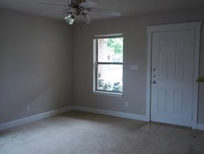Marble Falls apartment for rent - an empty room with a window and a ceiling fan